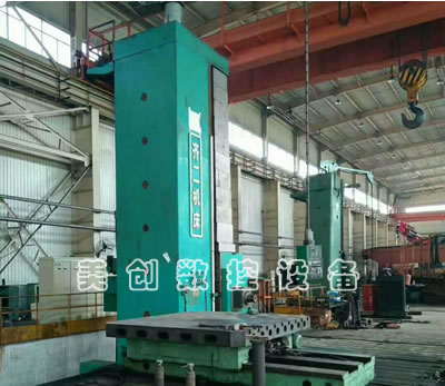 ������M��